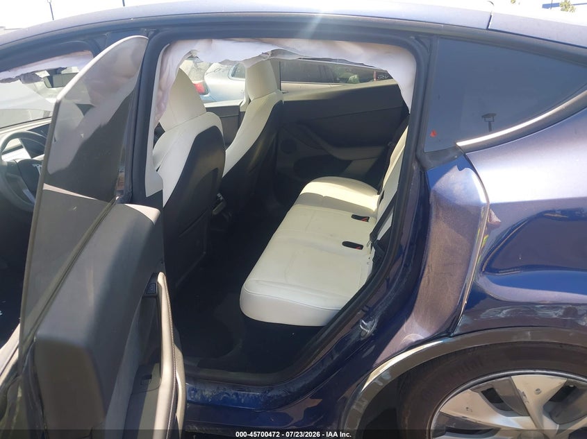 2023 Tesla Model y VIN 7SAYGDED7PF955961 IAAI salvage auction — LEFT SIDE, Wait Title, sold $4,600 on 2026-09-07 (photo 8)