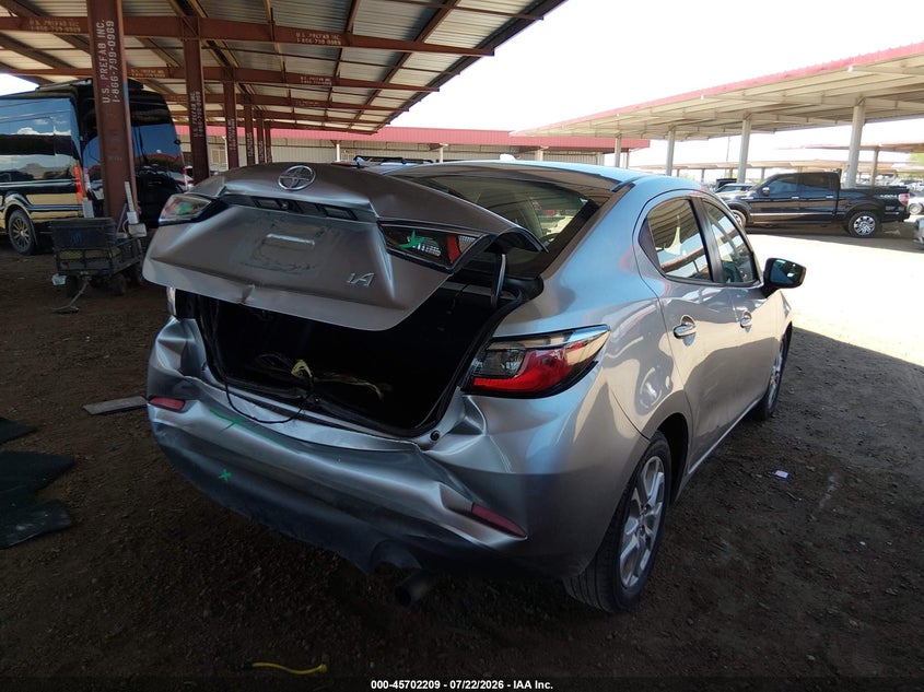 2016 Scion Ia VIN 3MYDLBZV9GY131514 IAAI salvage auction — REAR END, Wait Title, sold $1,800 on 2026-08-30 (photo 4)