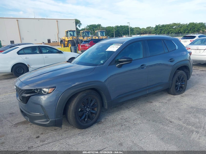 2025 Mazda Cx-50 VIN 7MMVABBMXSN332130 IAAI salvage auction — SIDE, Salvage Title, sold $8,100 on 2026-08-02 (photo 2)