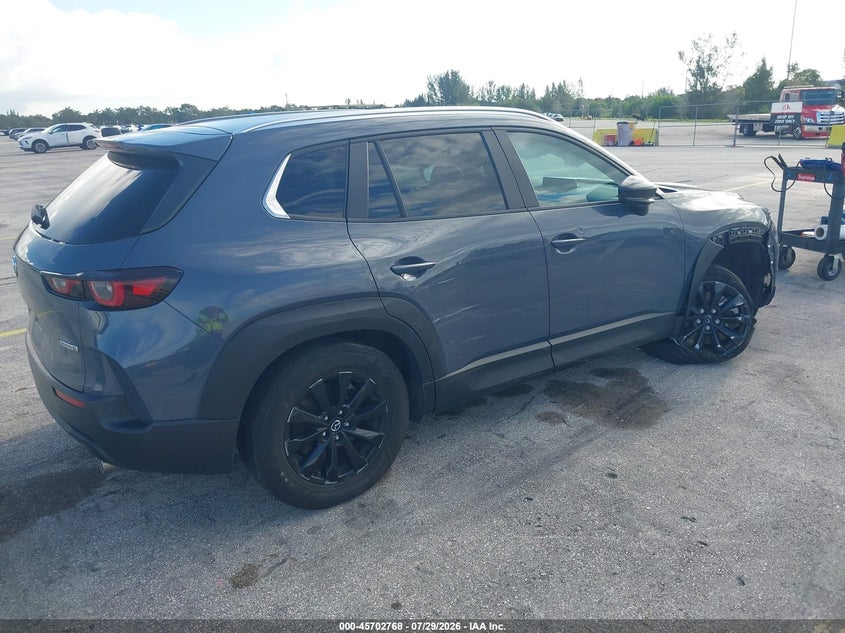 2025 Mazda Cx-50 VIN 7MMVABBMXSN332130 IAAI salvage auction — SIDE, Salvage Title, sold $8,100 on 2026-08-02 (photo 4)