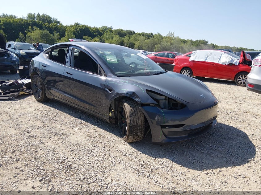 2023 Tesla Model 3 VIN 5YJ3E1EB3PF465480 — IAAI salvage auction photo