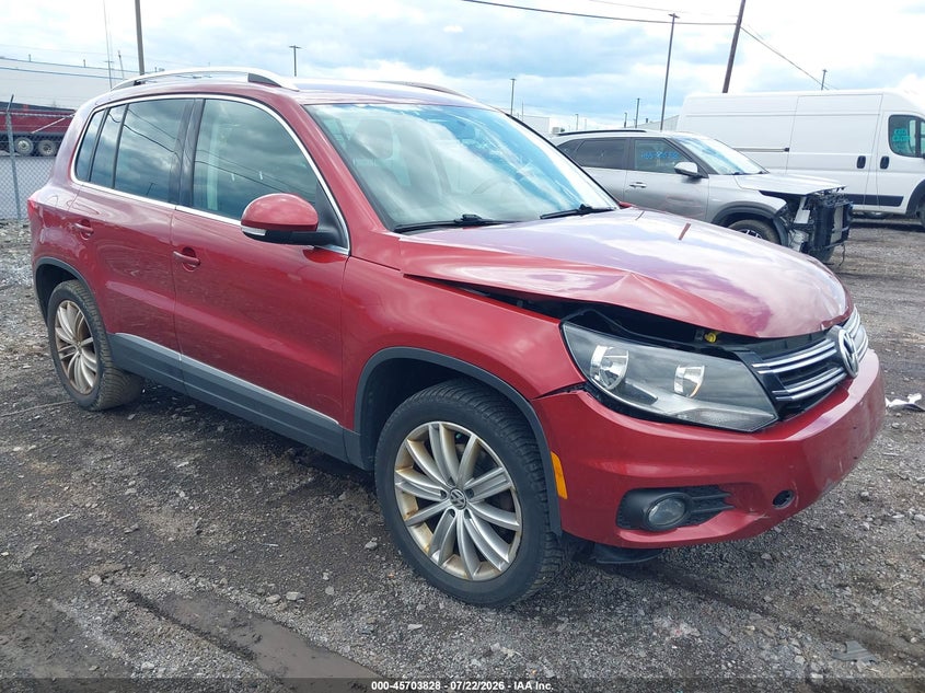 2014 Volkswagen Tiguan VIN WVGBV3AXXEW009327 IAAI salvage auction — FRONT END, Salvage Title, sold $700 on 2026-08-05 (photo 1)