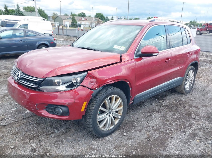 2014 Volkswagen Tiguan VIN WVGBV3AXXEW009327 IAAI salvage auction — FRONT END, Salvage Title, sold $700 on 2026-08-05 (photo 2)
