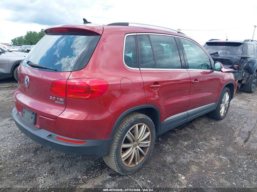 2014 Volkswagen Tiguan VIN WVGBV3AXXEW009327 IAAI salvage auction — FRONT END, Salvage Title, sold $700 on 2026-08-05 (photo 4)
