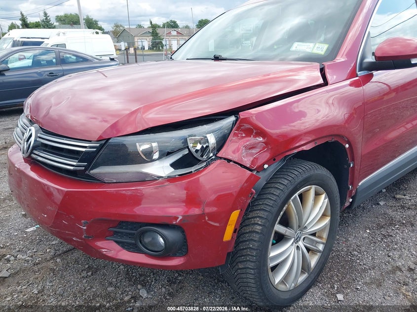 2014 Volkswagen Tiguan VIN WVGBV3AXXEW009327 IAAI salvage auction — FRONT END, Salvage Title, sold $700 on 2026-08-05 (photo 6)