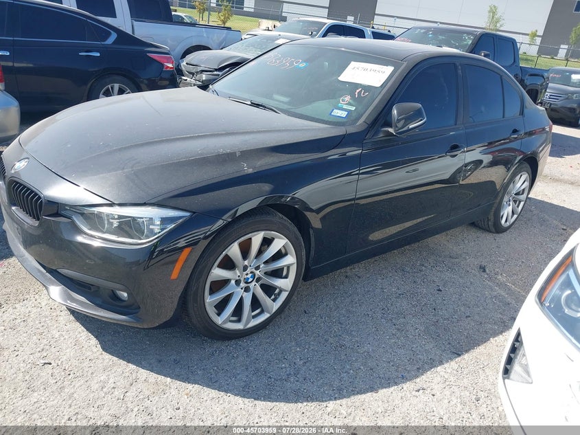 2018 BMW 3 series VIN WBA8E5G59JNV02221 IAAI salvage auction — NORMAL WEAR, Rebuilt -  Public Restricted (Oklahoma), sold $125 on 2026-08-04 (photo 2)