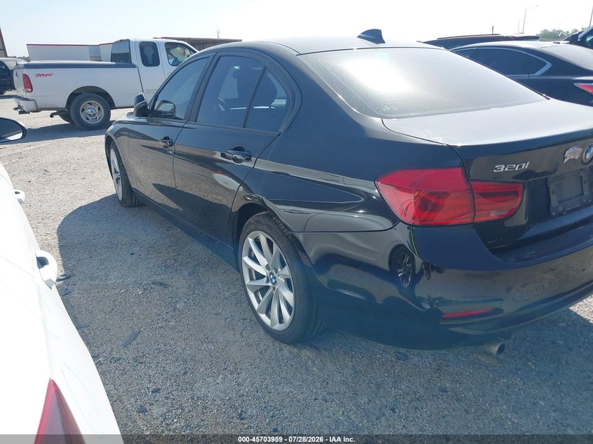 2018 BMW 3 series VIN WBA8E5G59JNV02221 IAAI salvage auction — NORMAL WEAR, Rebuilt -  Public Restricted (Oklahoma), sold $125 on 2026-08-04 (photo 3)