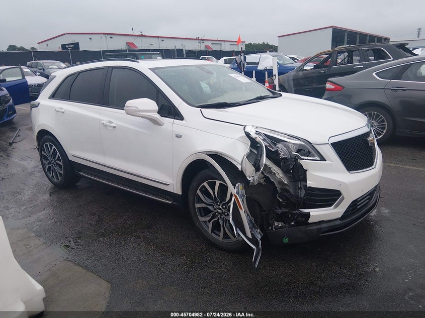 2021 Cadillac Xt5 VIN 1GYKNHRS5MZ110972 IAAI salvage auction — REAR END, Salvage Title, sold $10,300 on 2026-08-18 (photo 1)