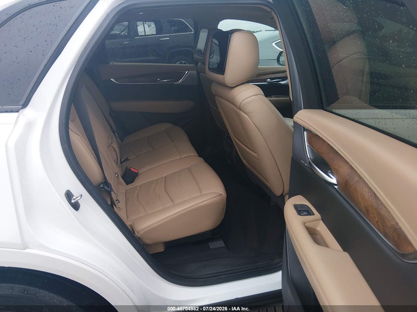 2021 Cadillac Xt5 VIN 1GYKNHRS5MZ110972 IAAI salvage auction — REAR END, Salvage Title, sold $10,300 on 2026-08-18 (photo 8)