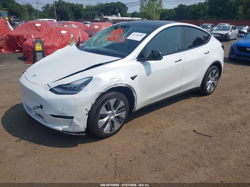 2022 Tesla Model y VIN 7SAYGDEE7NA009992 IAAI salvage auction — FRONT END, Wait Title, sold $9,825 on 2026-08-24 (photo 2)