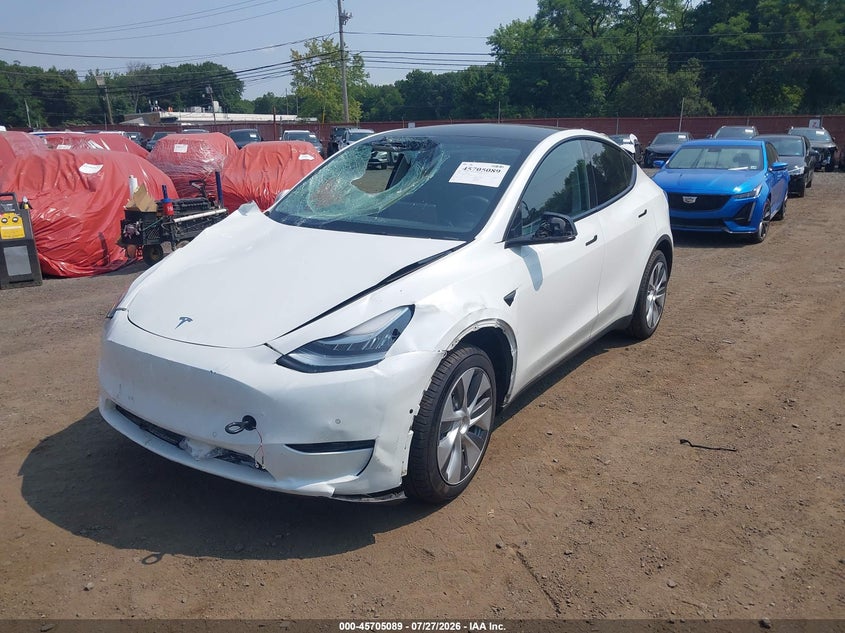 2022 Tesla Model y VIN 7SAYGDEE7NA009992 IAAI salvage auction — FRONT END, Wait Title, sold $9,825 on 2026-08-24 (photo 6)