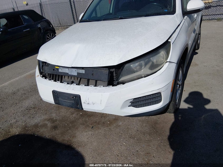 2014 Volkswagen Tiguan VIN WVGAV3AX8EW530784 IAAI salvage auction — FRONT END, Salvage Title, sold $900 on 2026-08-17 (photo 6)