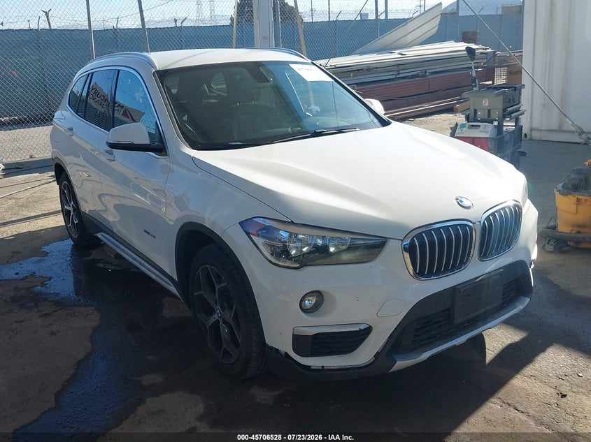 2016 BMW X1 VIN WBXHT3C33G5E49967 IAAI salvage auction — REAR END, Salvage (California), sold $4,700 on 2026-08-04 (photo 1)