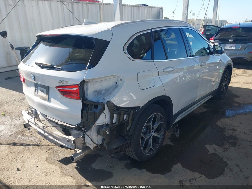 2016 BMW X1 VIN WBXHT3C33G5E49967 IAAI salvage auction — REAR END, Salvage (California), sold $4,700 on 2026-08-04 (photo 4)
