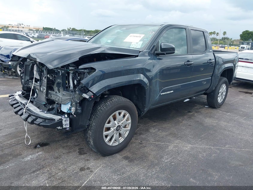 2026 Toyota Tacoma VIN 3TYKB5FNXTT035881 IAAI salvage auction — FRONT END, Rebuildable (Florida), sold $24,000 on 2026-08-02 (photo 2)