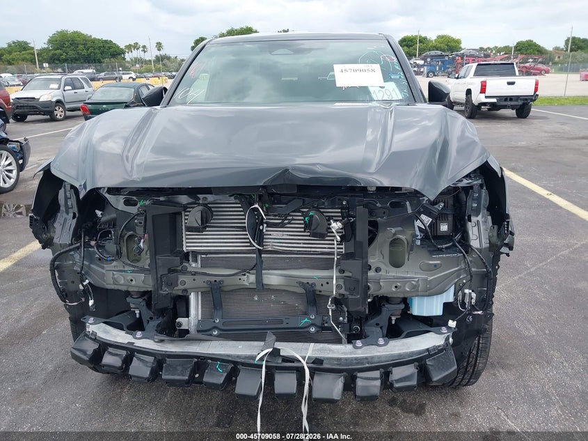 2026 Toyota Tacoma VIN 3TYKB5FNXTT035881 IAAI salvage auction — FRONT END, Rebuildable (Florida), sold $24,000 on 2026-08-02 (photo 6)