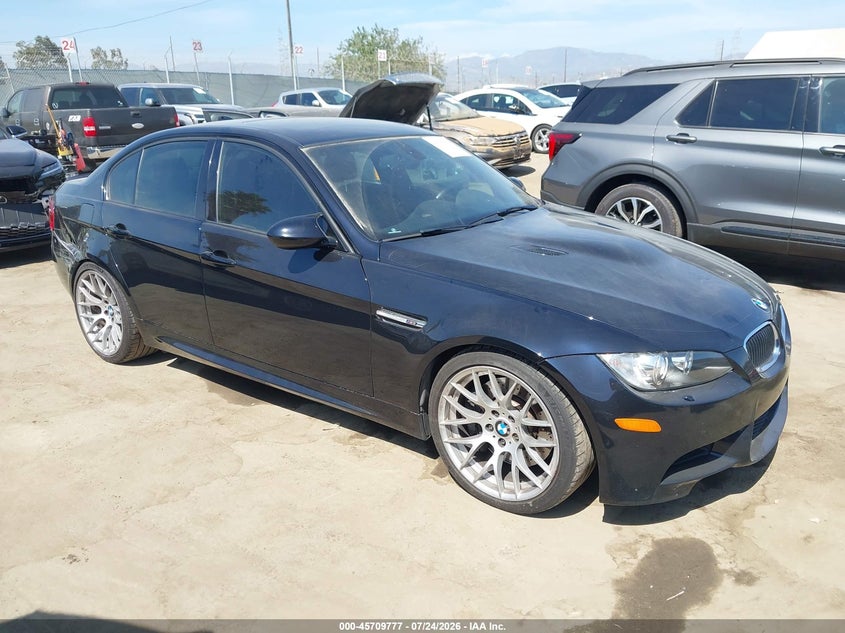 2011 BMW M3 VIN WBSPM9C56BE699051 — IAAI salvage auction photo
