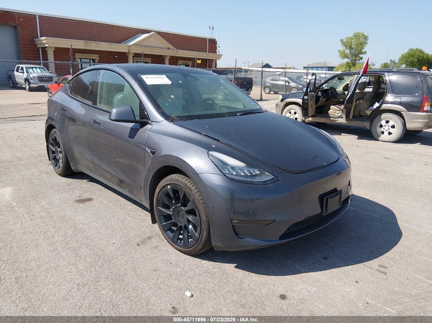 2023 Tesla Model y VIN 7SAYGAEE5PF584659 IAAI salvage auction — ALL OVER, Salvage Title, sold $10,100 on 2026-09-02 (photo 1)
