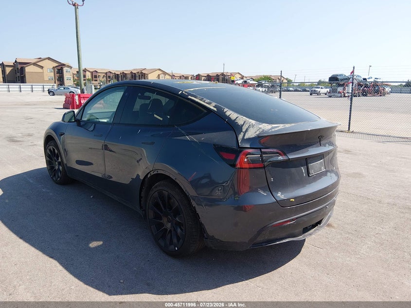 2023 Tesla Model y VIN 7SAYGAEE5PF584659 IAAI salvage auction — ALL OVER, Salvage Title, sold $10,100 on 2026-09-02 (photo 3)