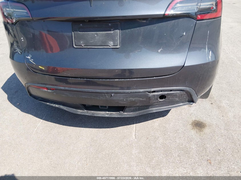 2023 Tesla Model y VIN 7SAYGAEE5PF584659 IAAI salvage auction — ALL OVER, Salvage Title, sold $10,100 on 2026-09-02 (photo 6)