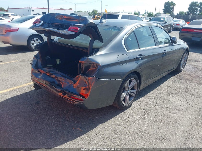 2018 BMW 3er VIN WBA8B9C52JEE82256 IAAI salvage auction — REAR END, Salvage Title, sold $5,275 on 2026-08-17 (photo 4)