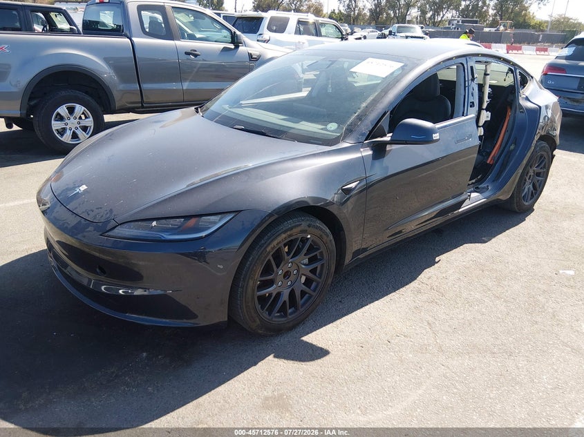 2024 Tesla Model 3 VIN 5YJ3E1EA2RF742968 IAAI salvage auction — REAR END, Wait Title, sold $10,450 on 2026-09-08 (photo 2)