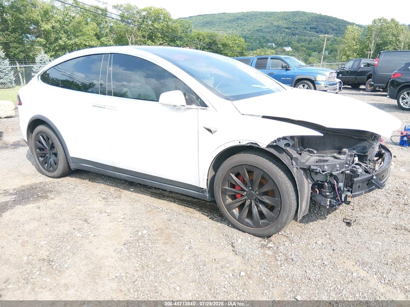 2017 Tesla Model x VIN 5YJXCBE27HF066196 — IAAI salvage auction photo