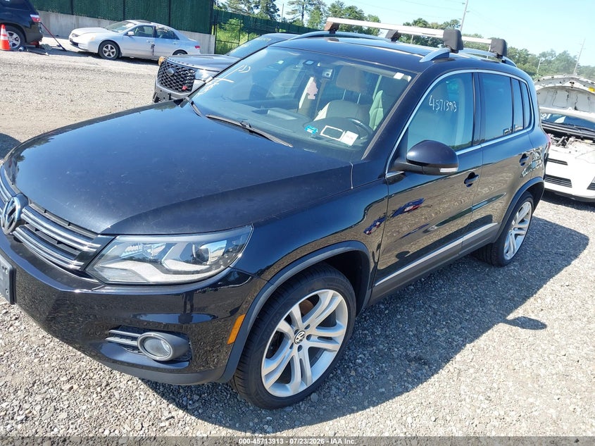 2016 Volkswagen Tiguan VIN WVGBV7AX5GW609733 IAAI salvage auction — NORMAL WEAR, Clear (New York), sold $25 on 2026-07-28 (photo 2)