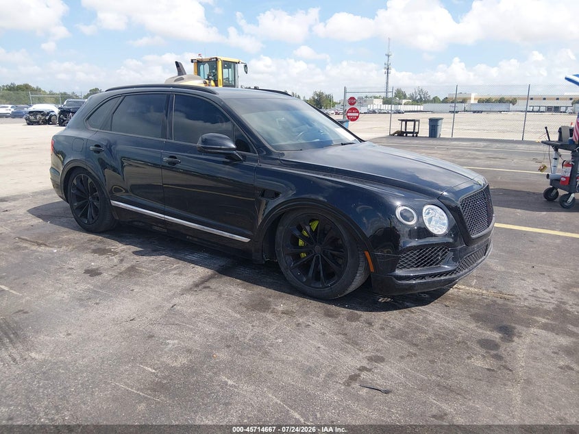 2020 Bentley Bentayga VIN SJAAM2ZV0LC030669 IAAI salvage auction — THEFT, Salvage Title, sold $1,050 on 2026-09-03 (photo 1)