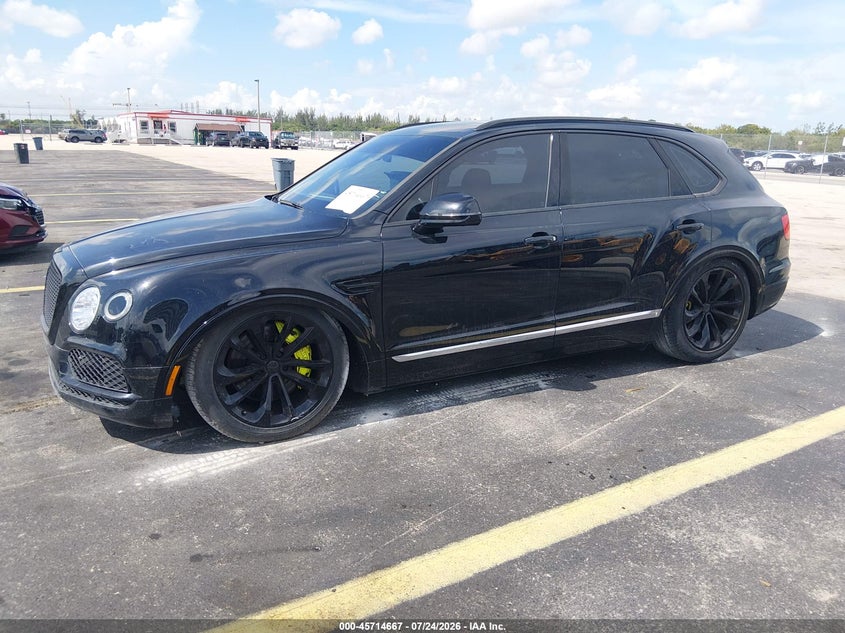 2020 Bentley Bentayga VIN SJAAM2ZV0LC030669 IAAI salvage auction — THEFT, Salvage Title, sold $1,050 on 2026-09-03 (photo 2)