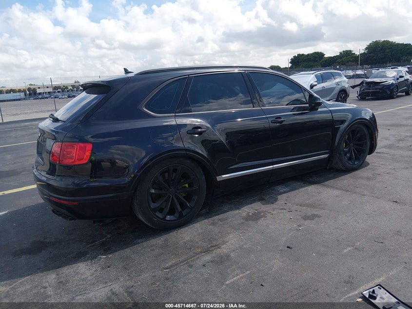 2020 Bentley Bentayga VIN SJAAM2ZV0LC030669 IAAI salvage auction — THEFT, Salvage Title, sold $1,050 on 2026-09-03 (photo 4)