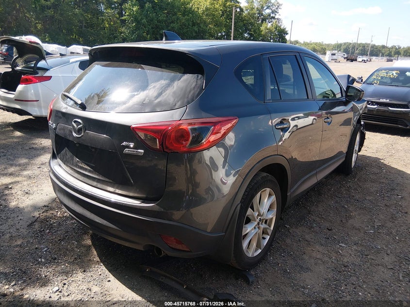 2014 Mazda Cx-5 VIN JM3KE4DY6E0371566 IAAI salvage auction — RIGHT FRONT, Salvage Title, sold $1,600 on 2026-08-22 (photo 4)