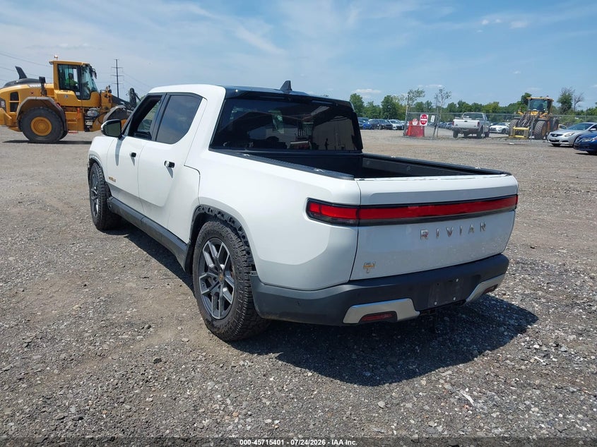 2023 Rivian R1t VIN 7FCTGAAAXPN022973 IAAI salvage auction — SIDE, Wait Title, sold $23,525 on 2026-09-14 (photo 3)