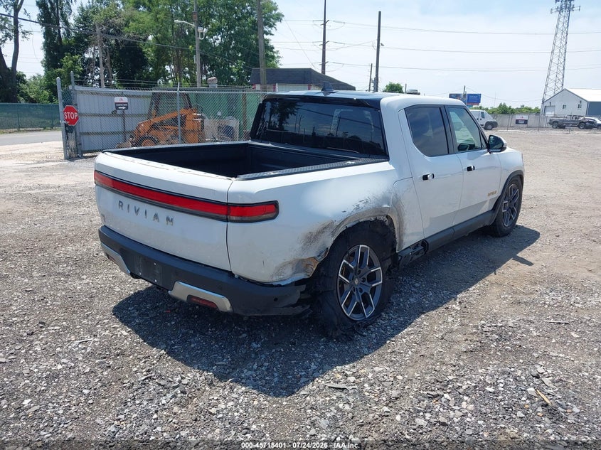 2023 Rivian R1t VIN 7FCTGAAAXPN022973 IAAI salvage auction — SIDE, Wait Title, sold $23,525 on 2026-09-14 (photo 4)