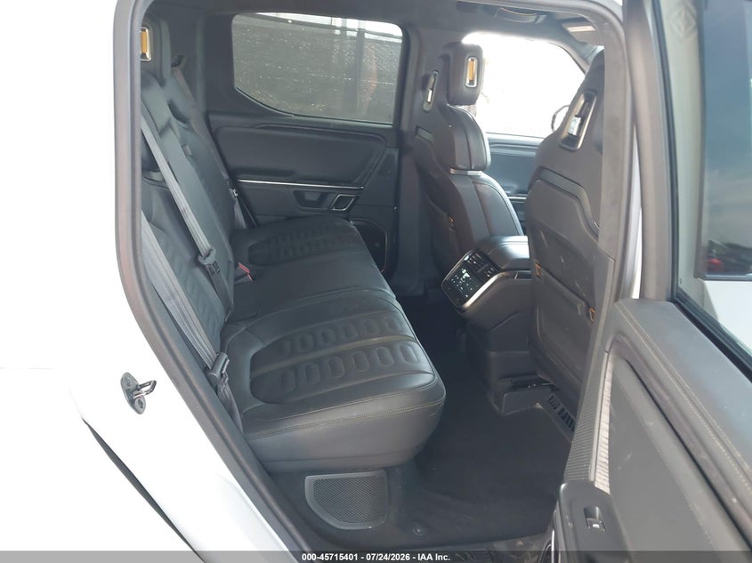 2023 Rivian R1t VIN 7FCTGAAAXPN022973 IAAI salvage auction — SIDE, Wait Title, sold $17,575 on 2026-09-08 (photo 7)