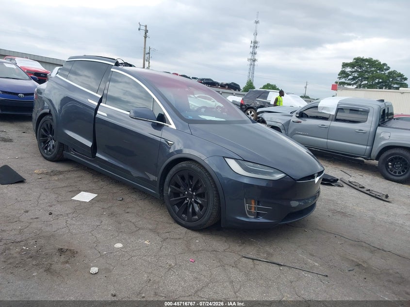 2017 Tesla Model x VIN 5YJXCDE24HF053739 — IAAI salvage auction photo
