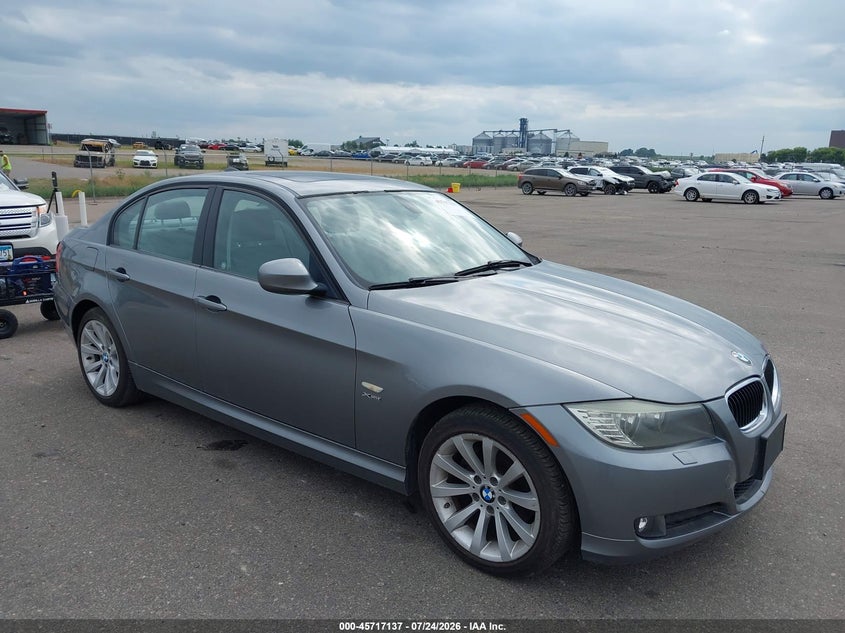2011 BMW 3 series VIN WBAPK7G58BNN78269 IAAI salvage auction — REAR END, Prior Salvage (Minnesota), sold $1,450 on 2026-08-03 (photo 1)