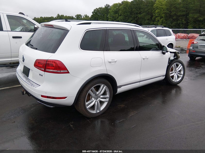 2014 Volkswagen Touareg VIN WVGEP9BP2ED012386 IAAI salvage auction — NORMAL WEAR, Salvage Title, sold $3,175 on 2026-08-04 (photo 4)