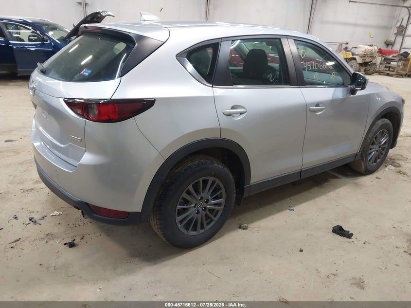 2019 Mazda Cx-5 VIN JM3KFBBM4K1635830 IAAI salvage auction — SIDE, Wait Title, sold $5,200 on 2026-09-10 (photo 4)