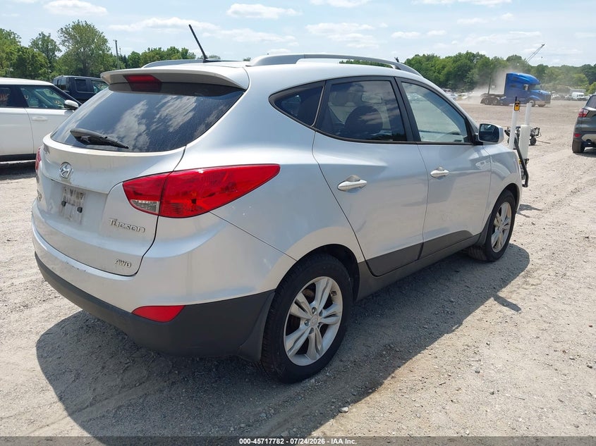 2011 Hyundai Tucson VIN KM8JUCAC8BU186297 IAAI salvage auction — NORMAL WEAR, Clear (New Jersey), sold $1,050 on 2026-07-28 (photo 4)