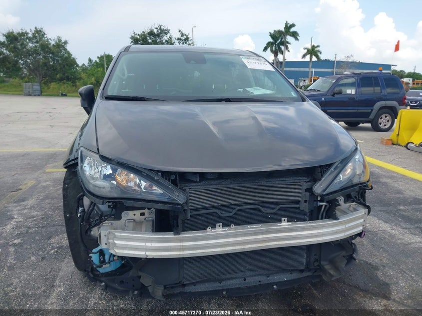 2023 Chrysler Voyager VIN 2C4RC1CG2PR610561 IAAI salvage auction — FRONT END, Enterprise Vehicles Clear Only (Ohio), sold $12,800 on 2026-08-06 (photo 6)