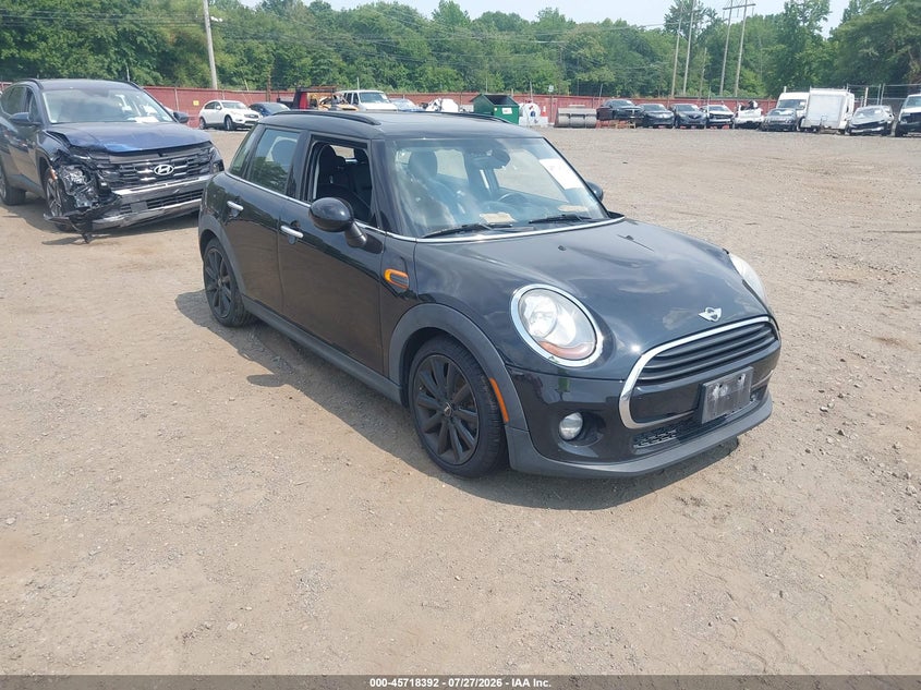 2017 Mini Hard top VIN WMWXU1C57H2E18412 IAAI salvage auction — WATER/FLOOD, Wait Title, sold $700 on 2026-08-19 (photo 1)