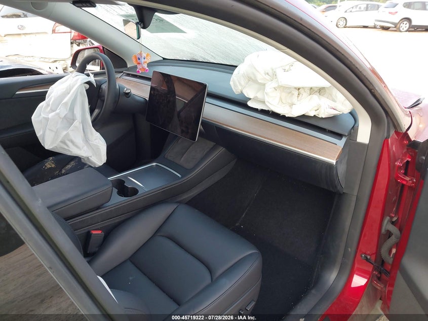 2024 Tesla Model y VIN 7SAYGDED2RF110387 IAAI salvage auction — FRONT END, Salvage Title, sold $10,000 on 2026-08-27 (photo 5)