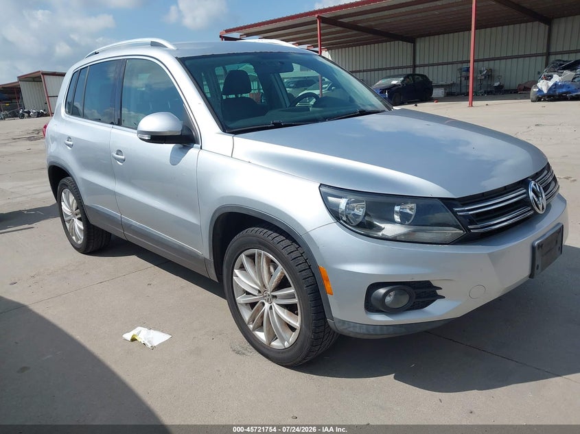 2013 Volkswagen Tiguan VIN WVGAV3AX0DW596146 IAAI salvage auction — NORMAL WEAR, Original (Texas), sold $1,100 on 2026-08-04 (photo 1)