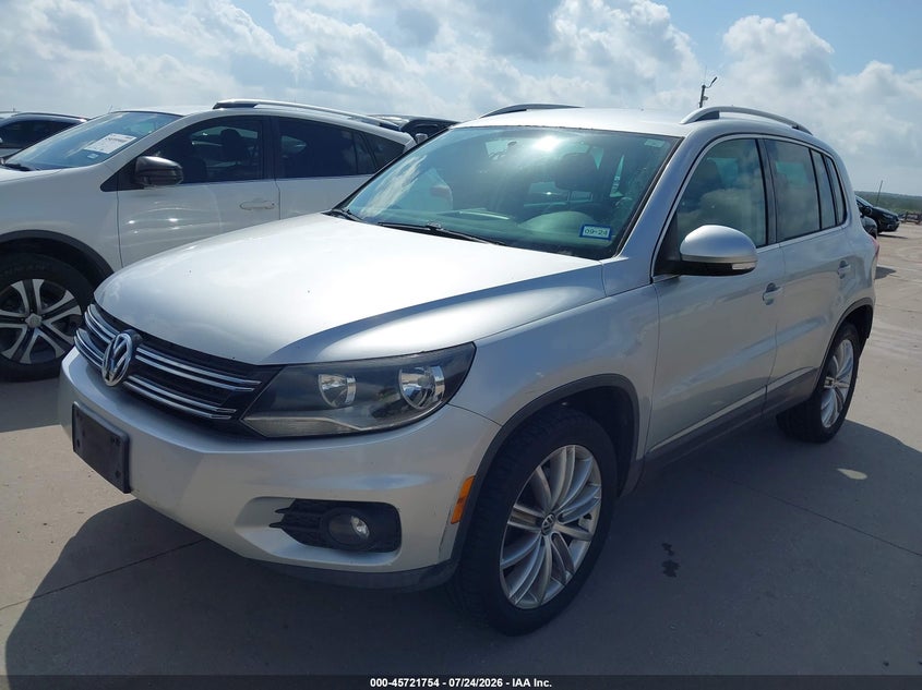 2013 Volkswagen Tiguan VIN WVGAV3AX0DW596146 IAAI salvage auction — NORMAL WEAR, Original (Texas), sold $1,100 on 2026-08-04 (photo 2)