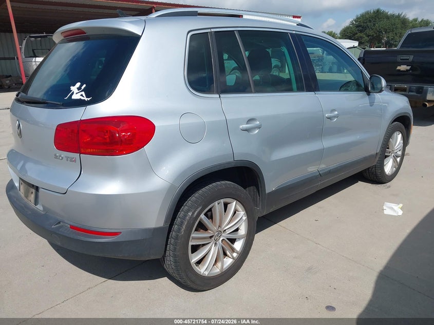 2013 Volkswagen Tiguan VIN WVGAV3AX0DW596146 IAAI salvage auction — NORMAL WEAR, Original (Texas), sold $1,100 on 2026-08-04 (photo 4)
