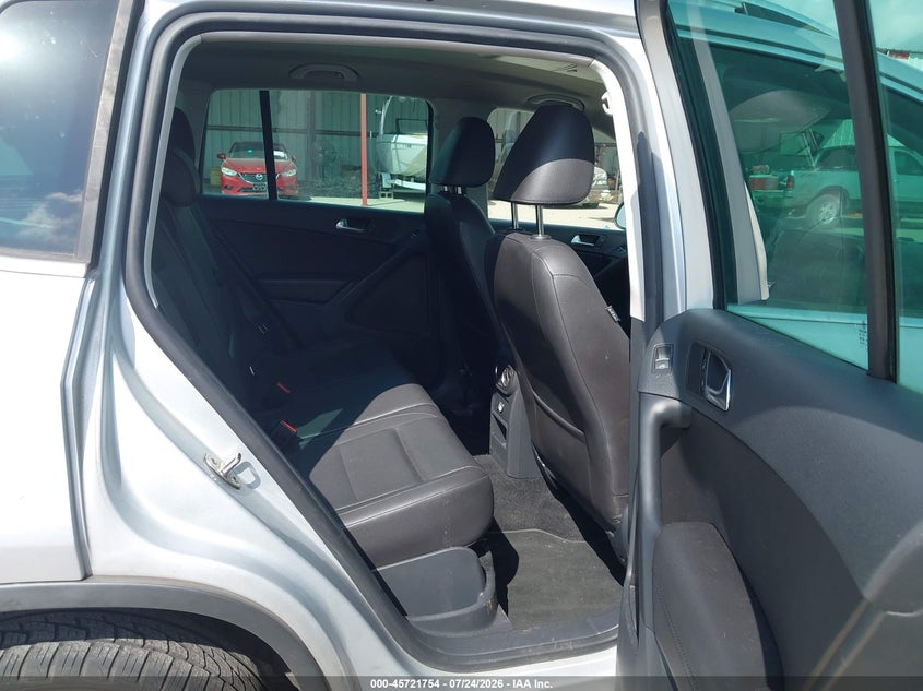 2013 Volkswagen Tiguan VIN WVGAV3AX0DW596146 IAAI salvage auction — NORMAL WEAR, Original (Texas), sold $1,100 on 2026-08-04 (photo 8)