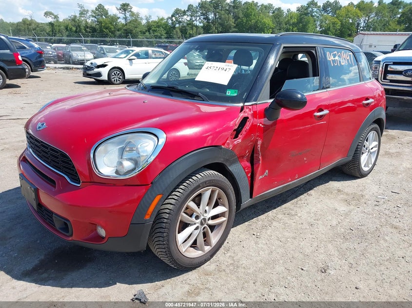 2013 Mini Countryman VIN WMWZC5C52DWM15730 IAAI salvage auction — SIDE, Salvage Title, sold $675 on 2026-08-19 (photo 2)