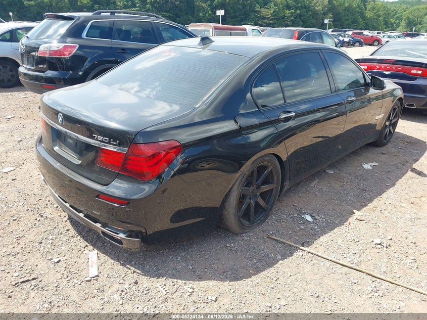 2014 BMW 7 series VIN WBAYE8C53ED135982 IAAI salvage auction — NORMAL WEAR, Clear (Alabama), sold $200 on 2026-08-23 (photo 4)