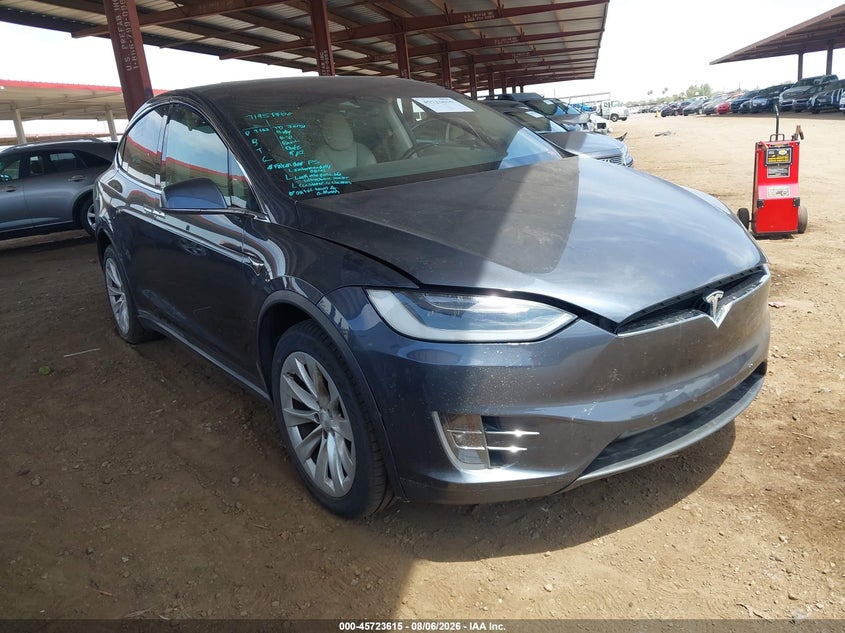 2018 Tesla Model x VIN 5YJXCBE27JF102233 — IAAI salvage auction photo